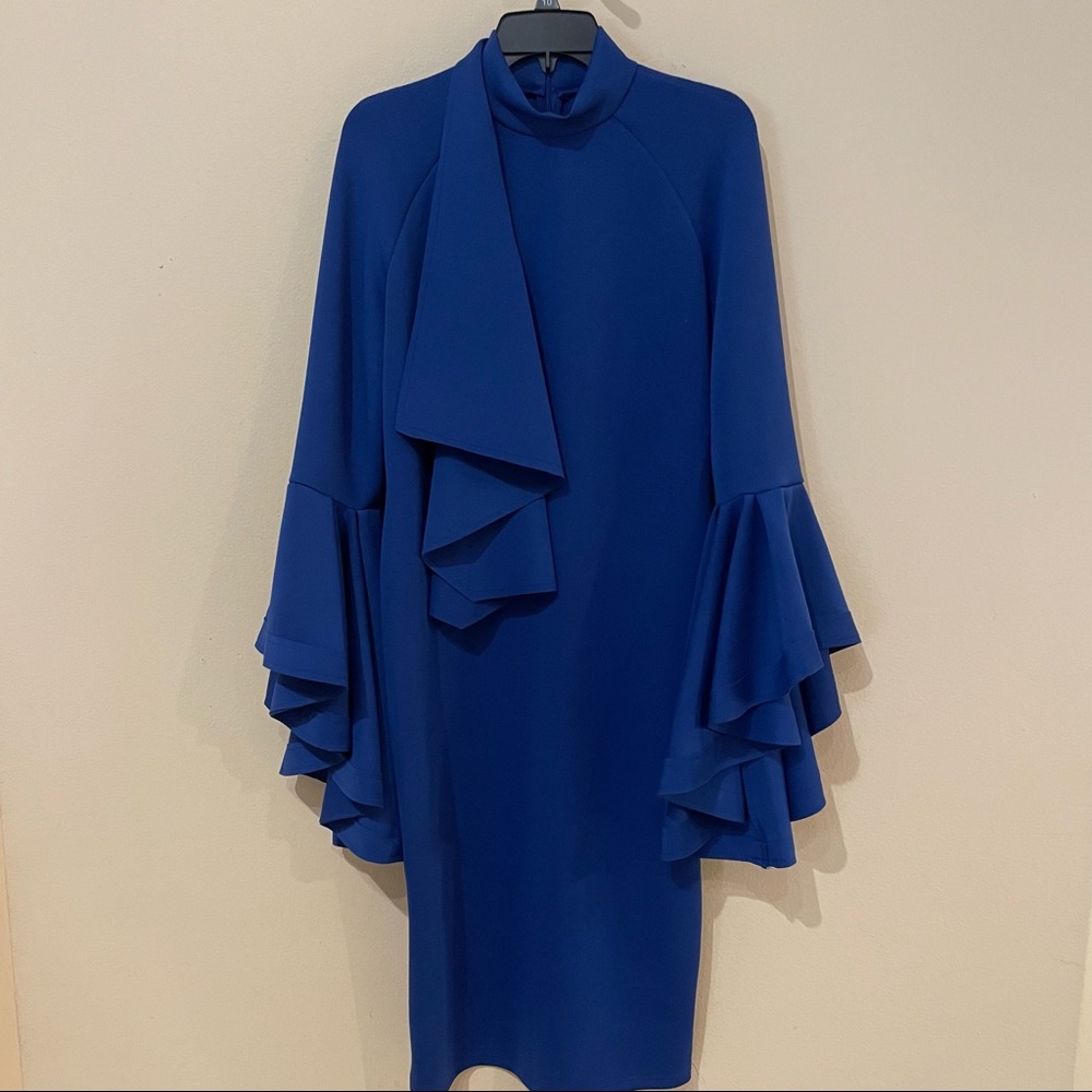 Elegant blue dress.  Unique and stylish. Excellent condition.  Worn once.